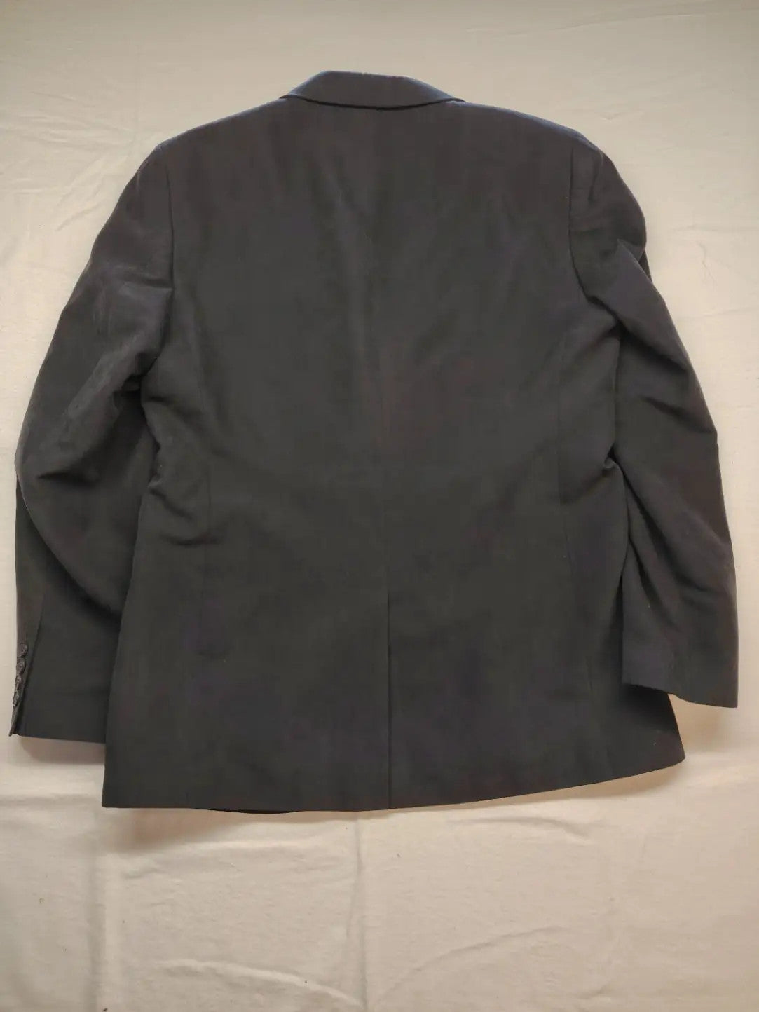 dunmore black blazer two-button design with falling lapels and multiple pockets