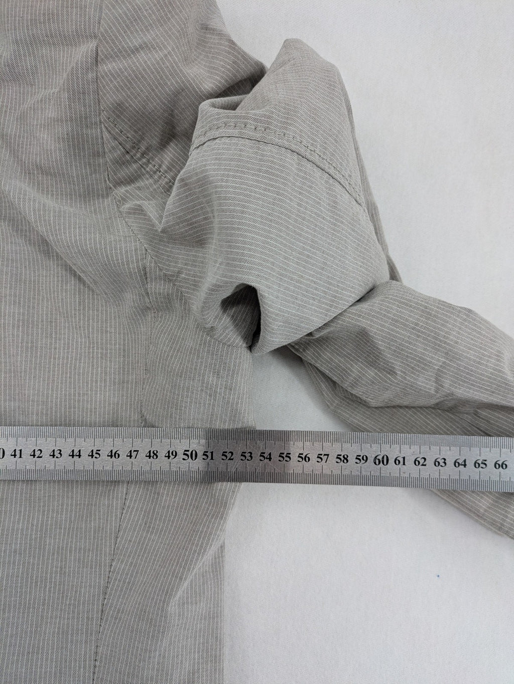 Camel Active grey cord blazer with classic two-button closure and practical zippered inner pockets.
