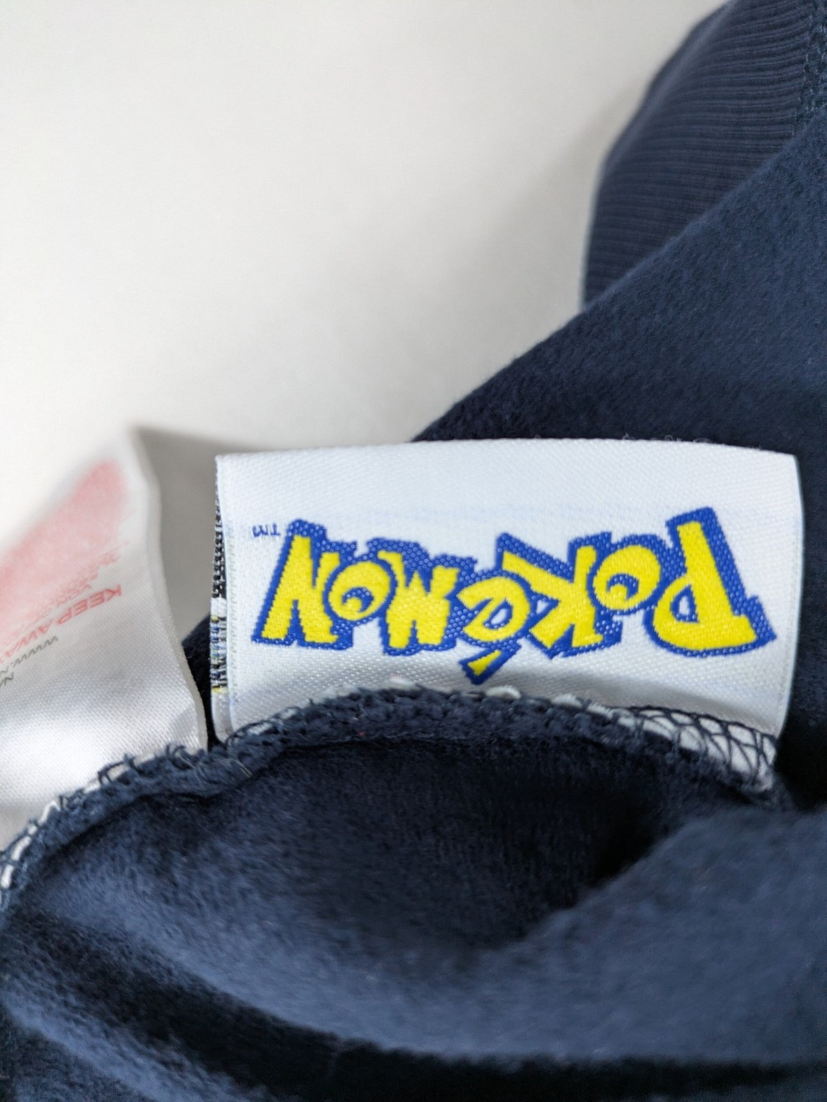 name it turtle neck jumper dark blue large Pikachu graphic print 2022
