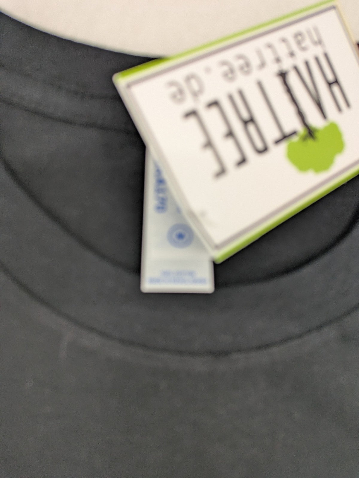 Bandshirt grey band t-shirt featuring yellow Nirvana smiley logo graphic, 100% cotton.