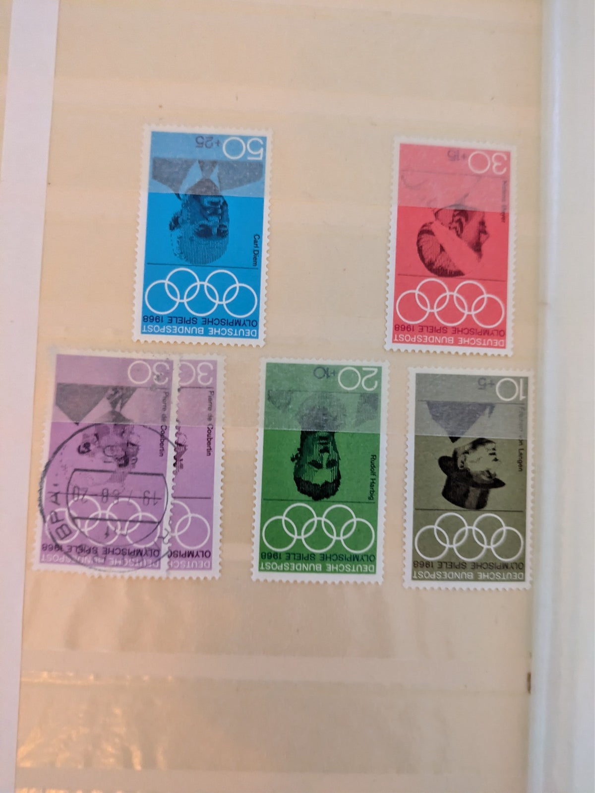 Beige postage stamp album featuring over 1000 stamps from Germany and Europe.