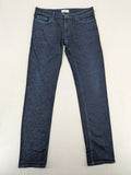 DISTRIKT NØRREBRO blue slim fit jeans with classic rinse wash and stretch denim material.