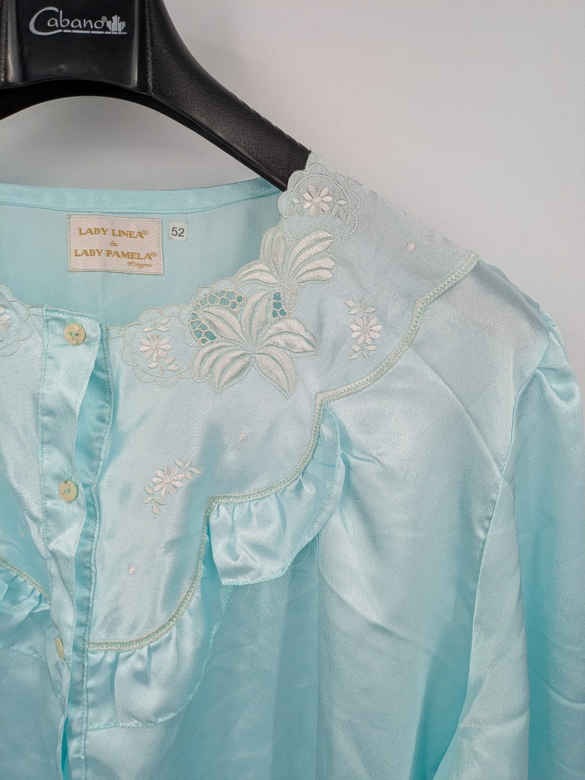 Linea blue vintage nightgown satin fabric with embroidered floral lace collar and ruffles.