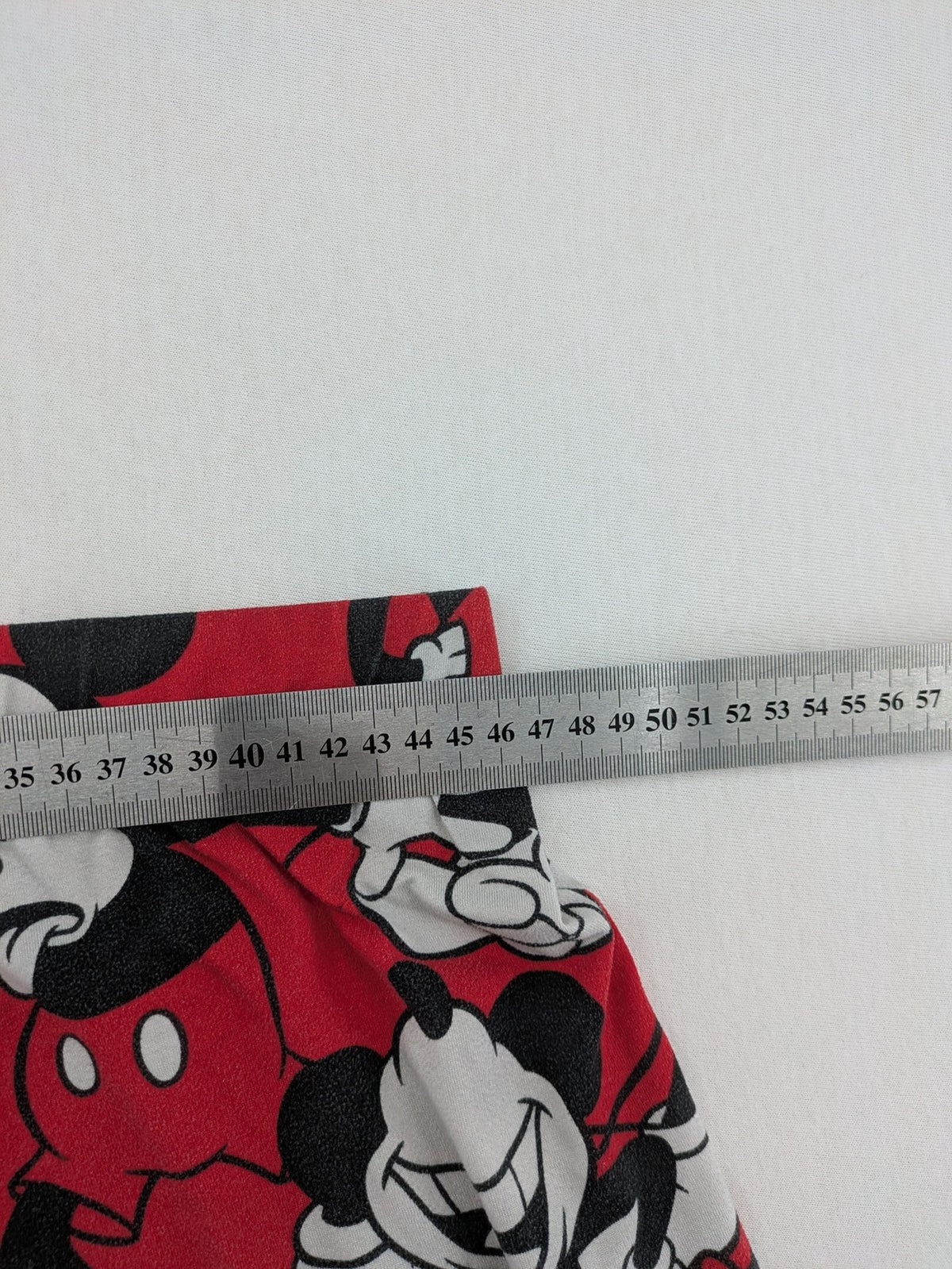 Disney loungewear set red and black with allover Mickey Mouse print and long sleeves.