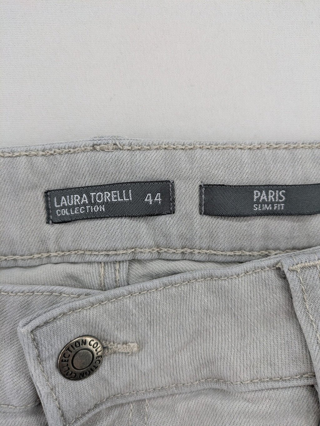 Laura Torelli grey straight jeans with classic 5-pocket design and slim fit silhouette.