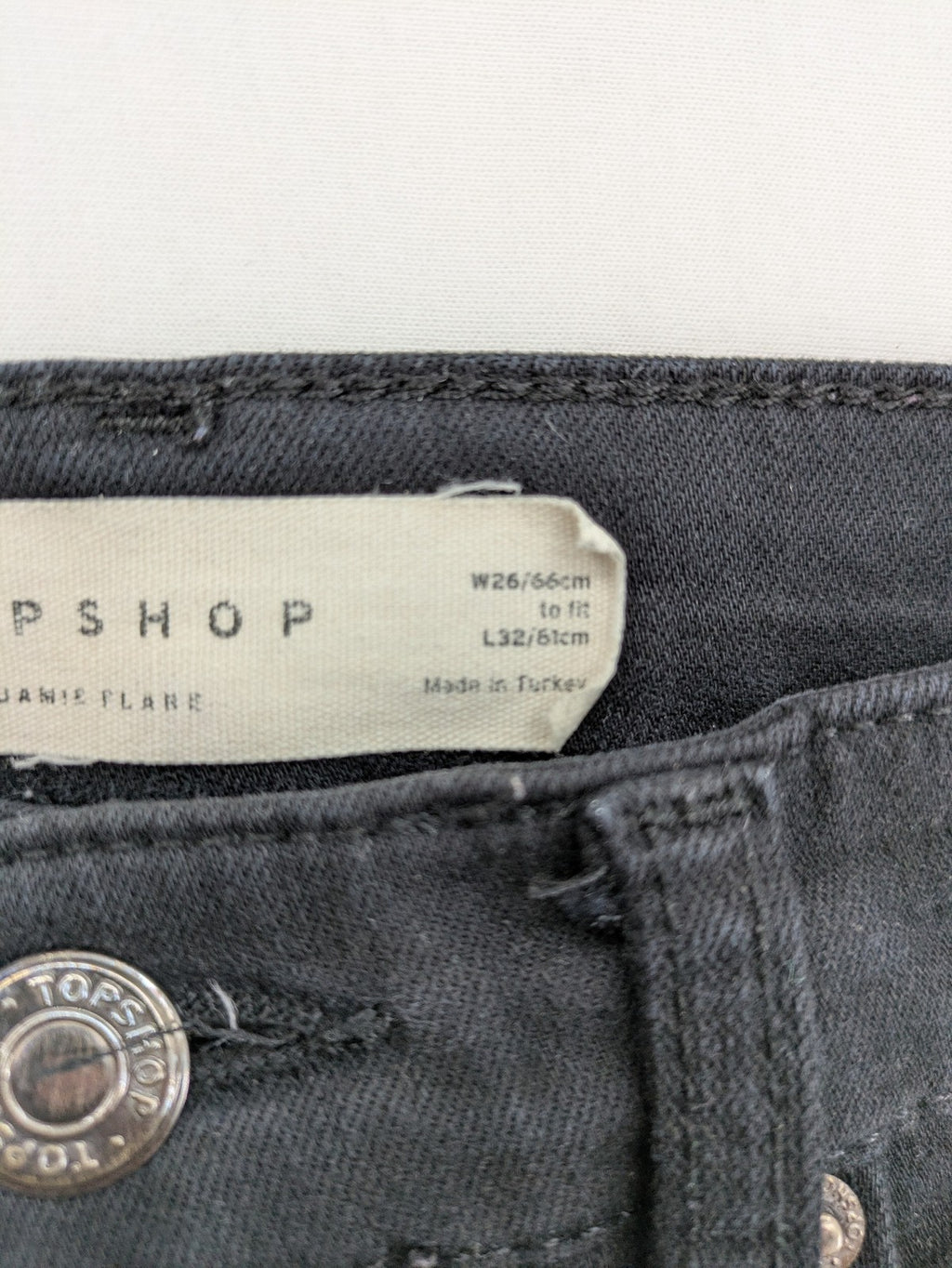 Topshop black Jamie flare jeans high waist stretch denim with classic silhouette.