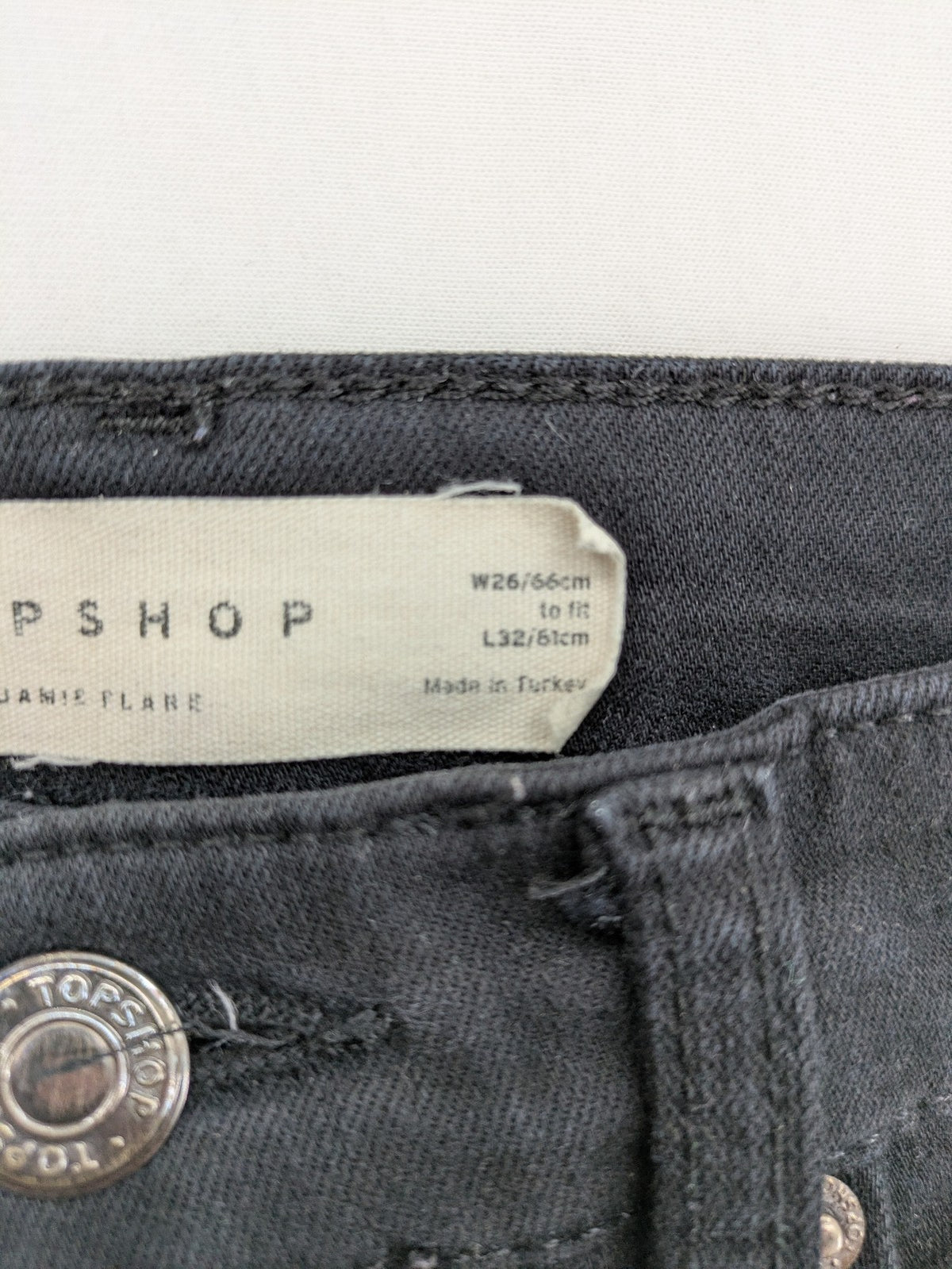 Topshop black Jamie flare jeans high waist stretch denim with classic silhouette.