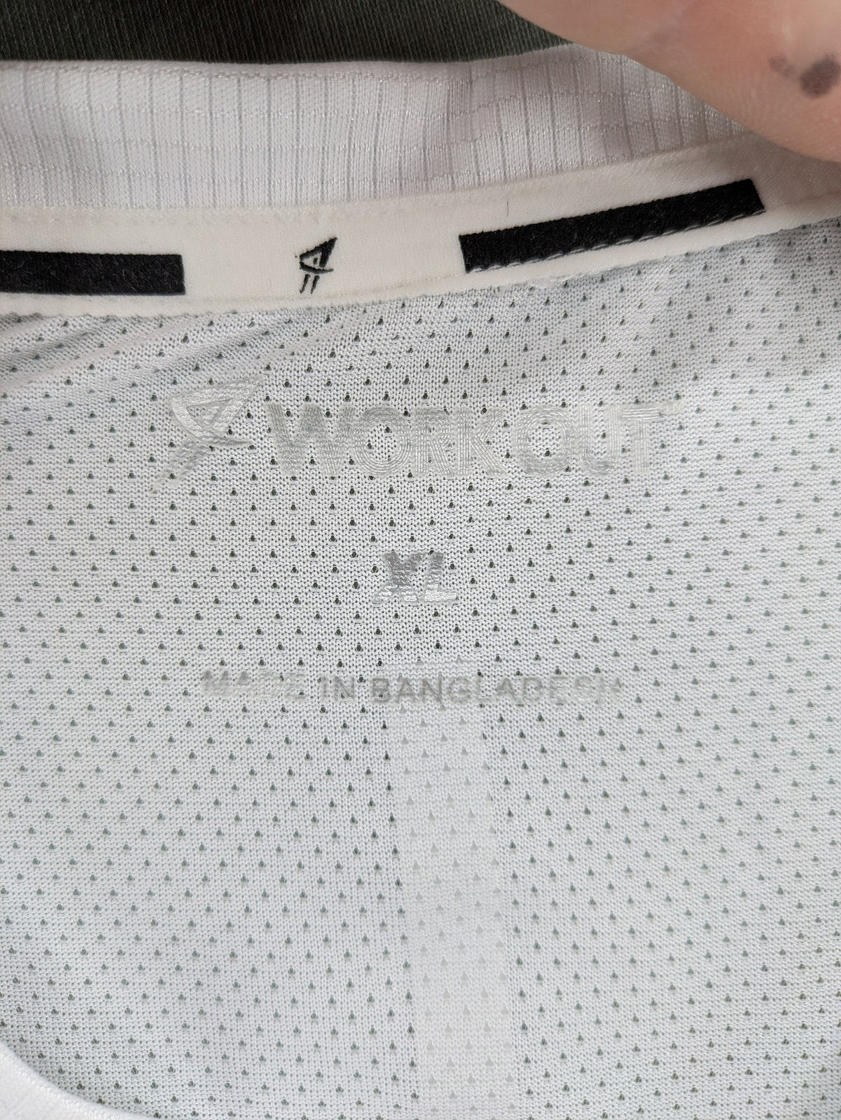 Smilodox white workout t-shirt with logo on chest and reflective detail on back.