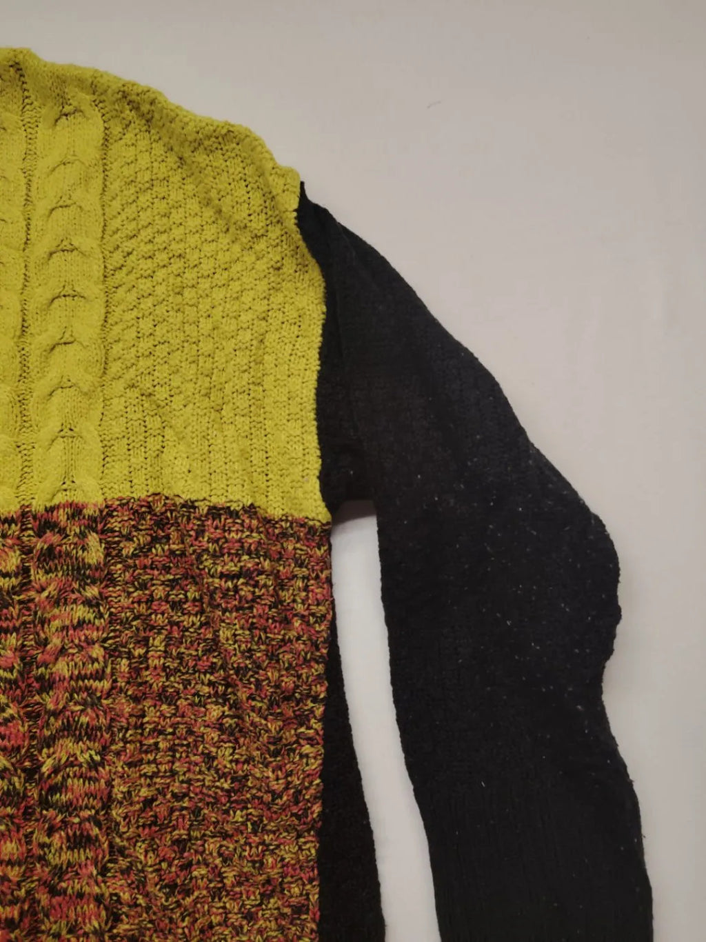 angel of style turtle neck jumper black brown yellow colorblock design with cable knit pattern