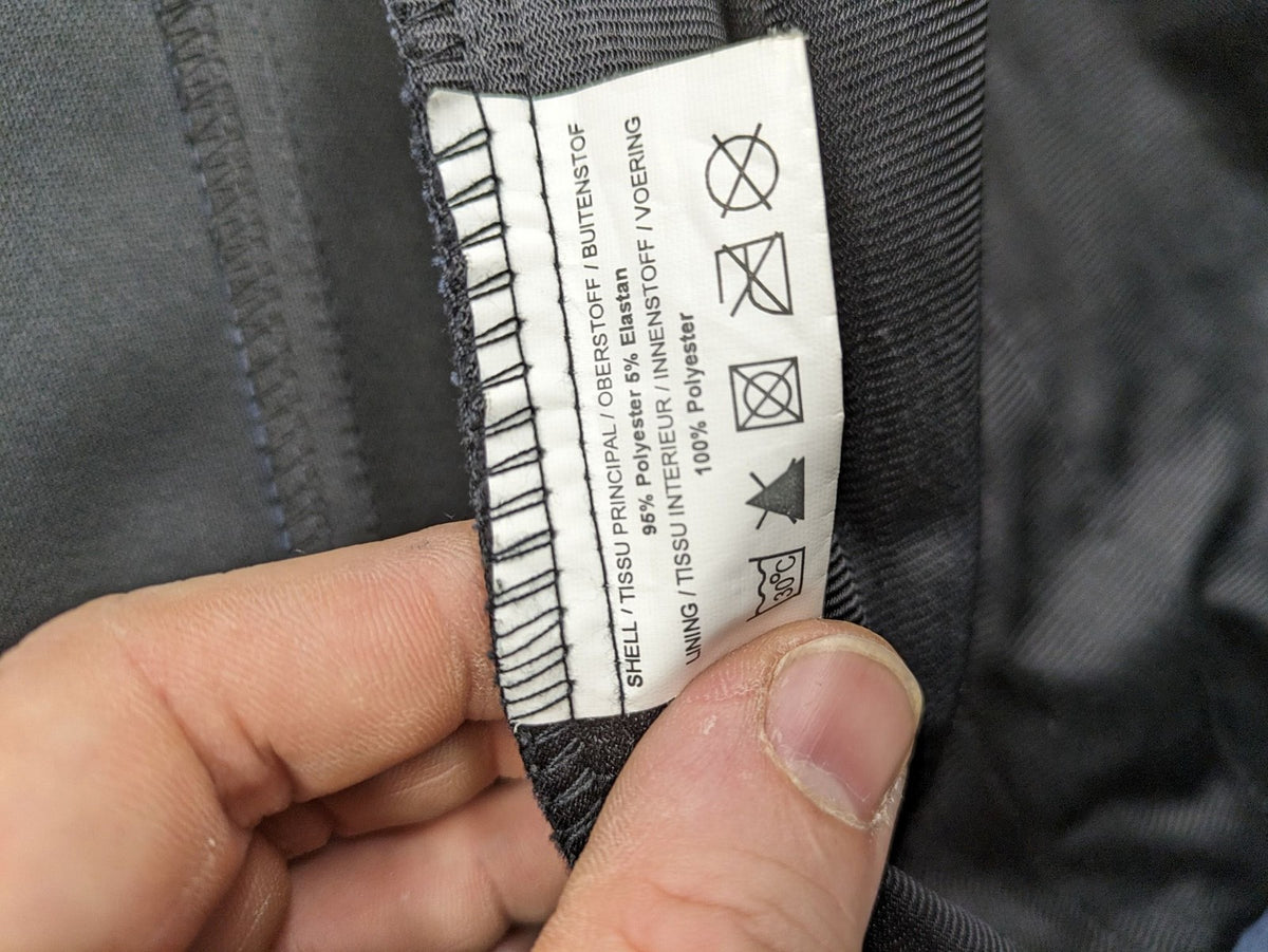 Life Line grey softshell jacket with adjustable hood and durable wind-resistant material.