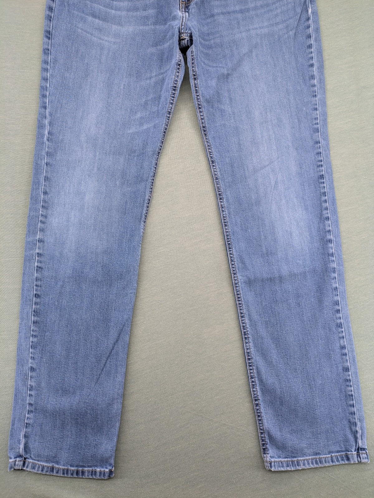 Bugatti blue straight jeans with classic 5-pocket design and light wash denim.