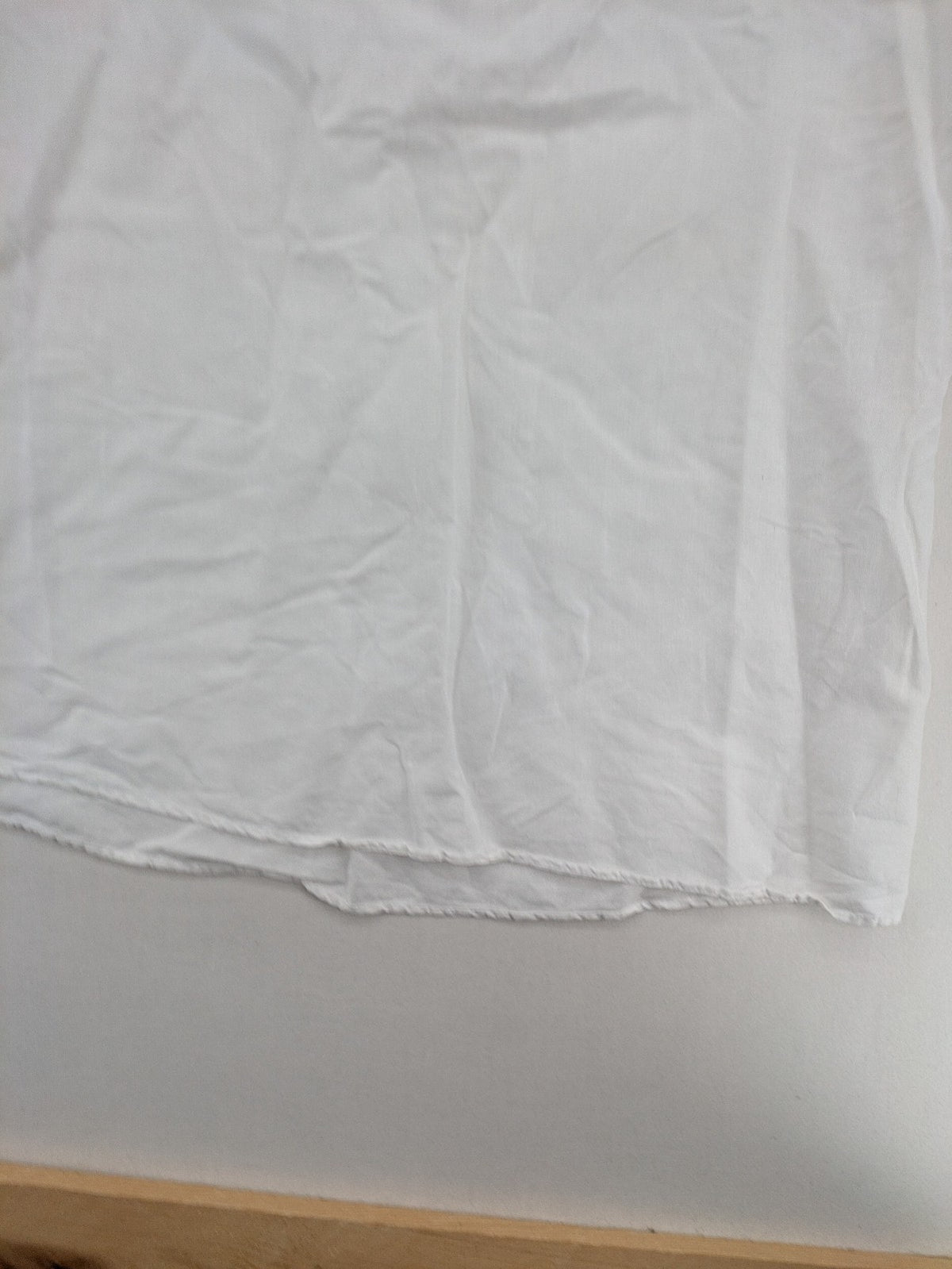 Canda white tunic top with embroidered V-neck, pearl and sequin details, 3/4 sleeves.