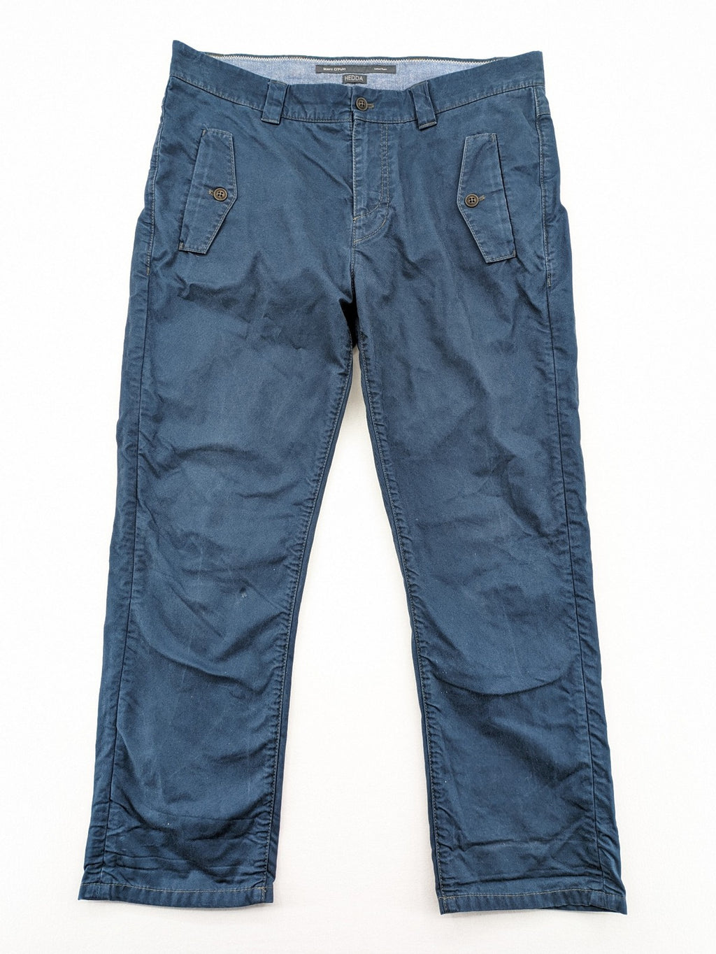 Marc O'Polo blue chino pants with button flap pockets and relaxed fit design.