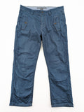 Marc O'Polo blue chino pants with button flap pockets and relaxed fit design.