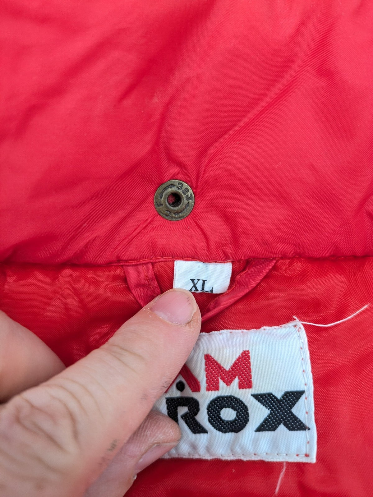 Rox red puffer vest with detachable sleeves and hood, vintage style.