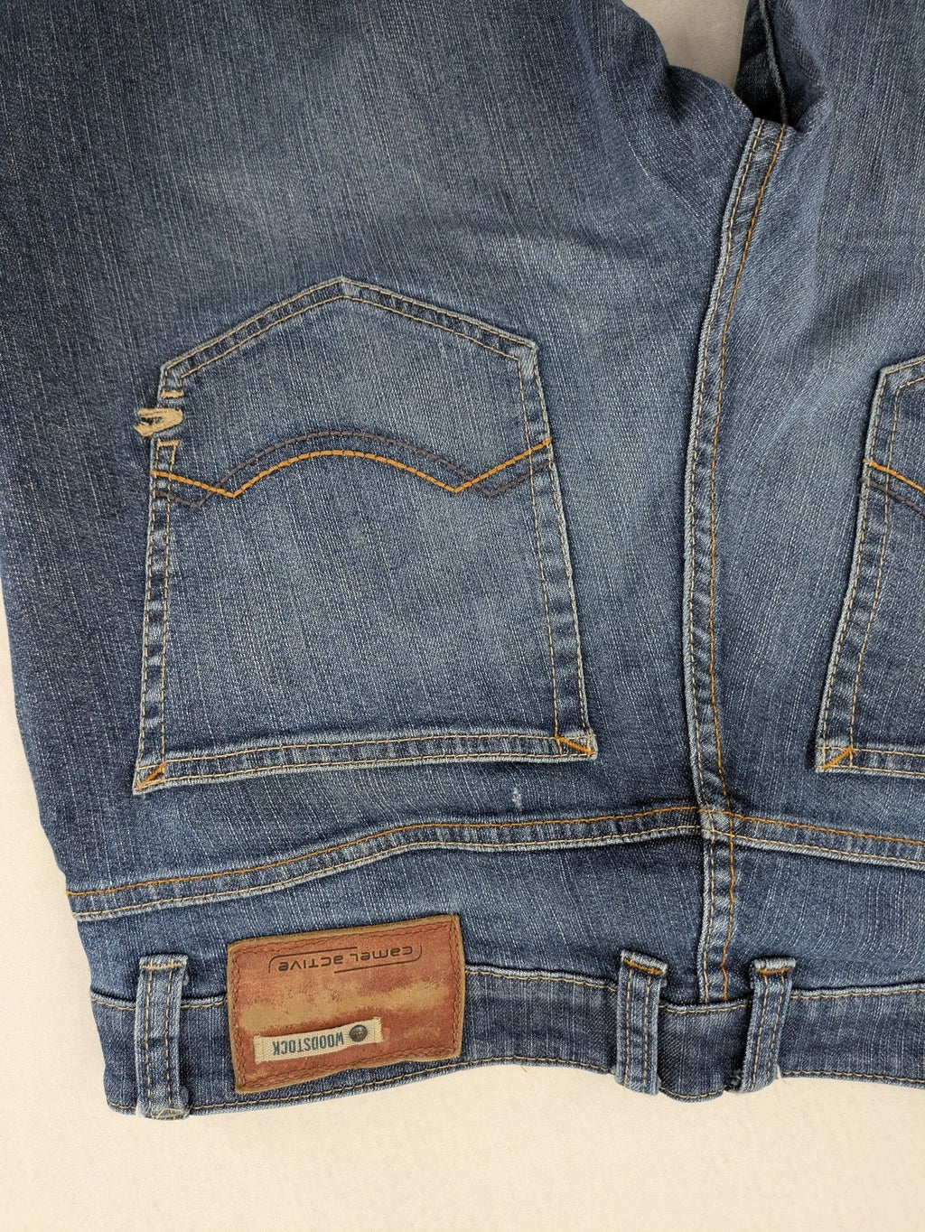Camel Active blue straight jeans with classic 5-pocket design and logo patch.
