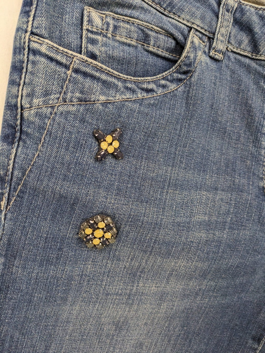 Gerry Weber blue straight jeans with decorative rhinestone appliqués and stretch denim material.