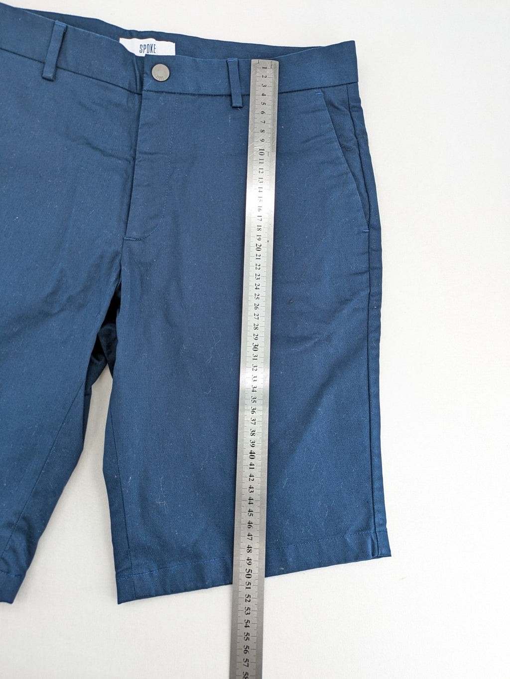 Spoke navy chino shorts flat front with unique printed pocket lining.