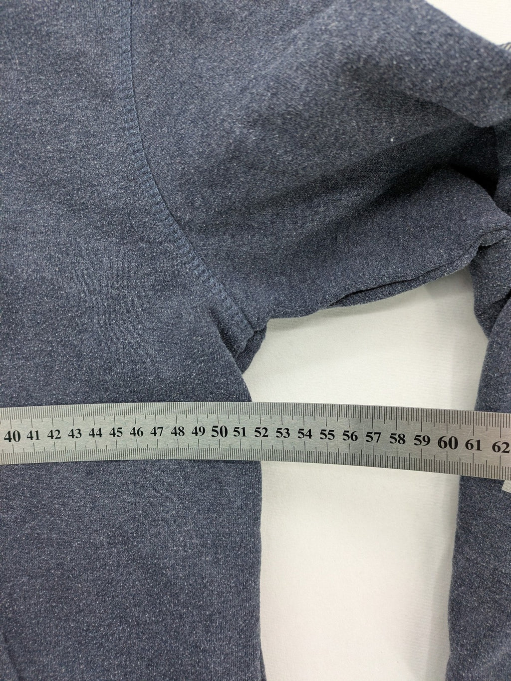 s.Oliver green turtle neck sweatshirt with adjustable drawstrings and graphic detail on sleeve