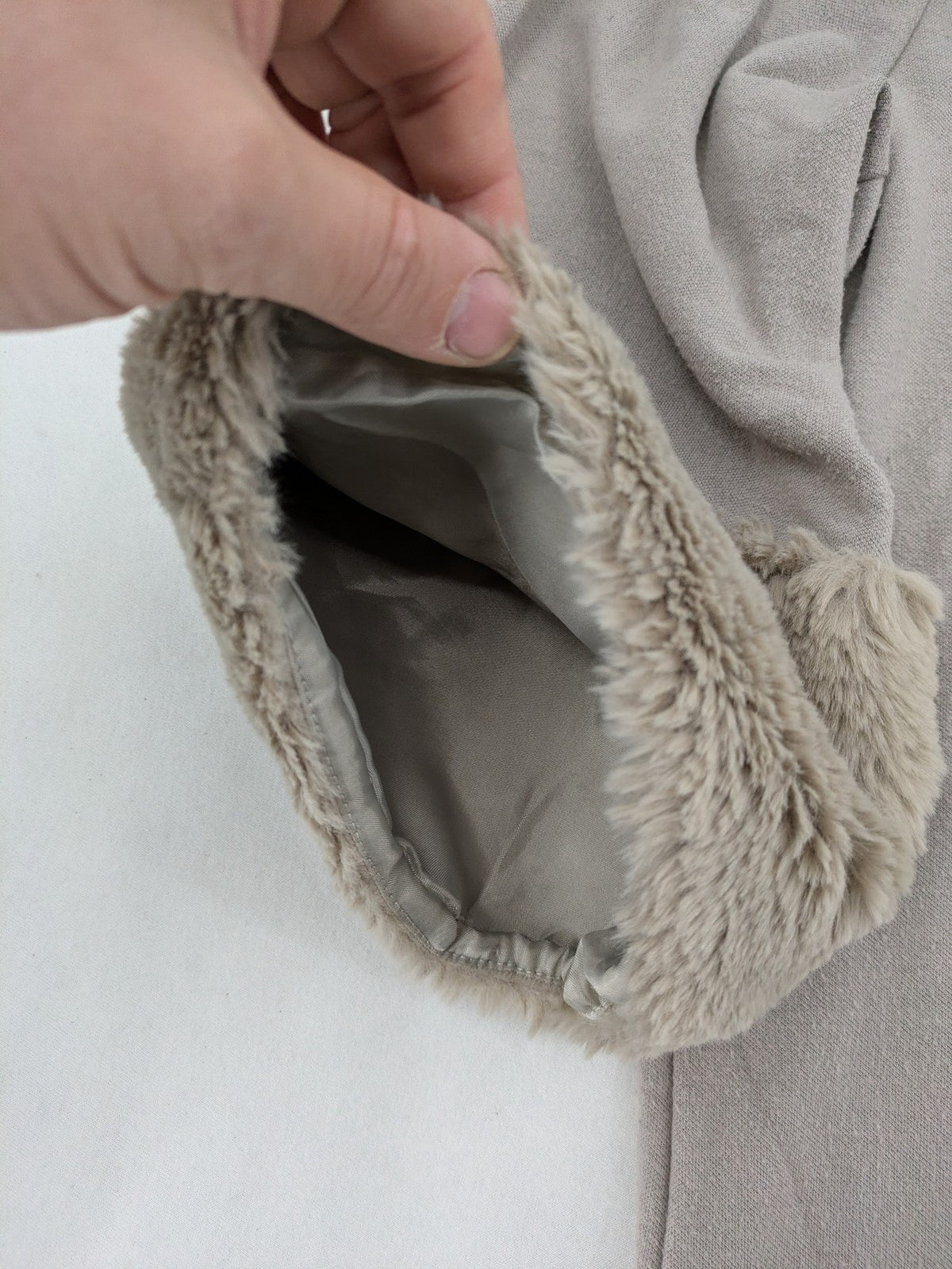 Alba Moda beige turtle neck jumper with plush faux fur cuffs and 3/4 sleeves.