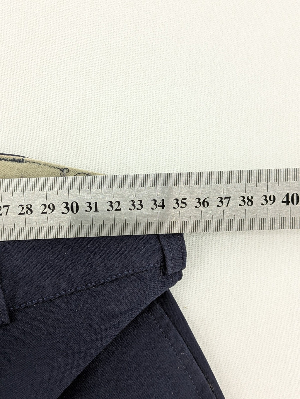 H&KM beige riding pants with dark blue full seat and front zippers.