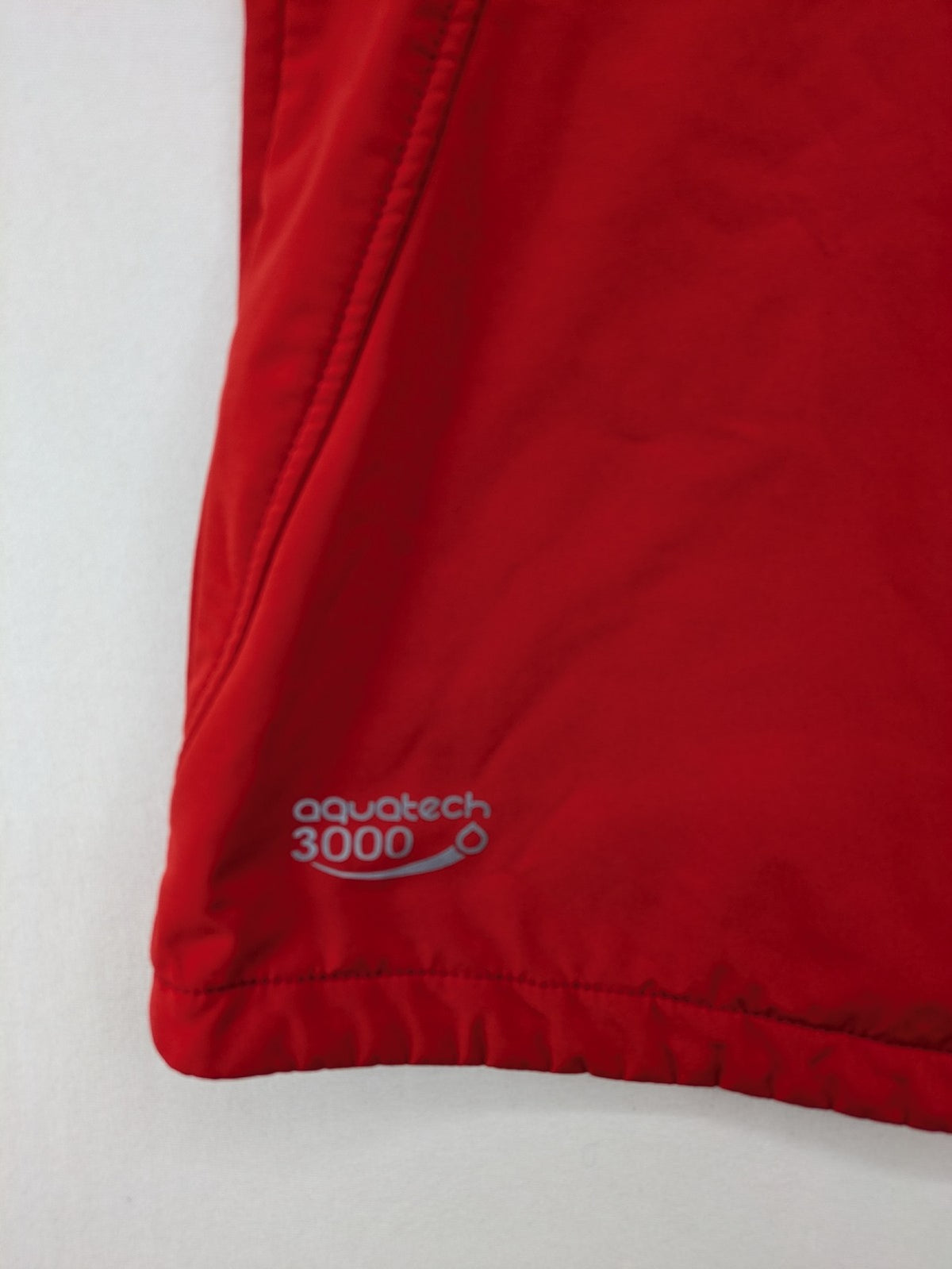4F red softshell jacket with fleece lining and Aquatech 3000 logo detail.