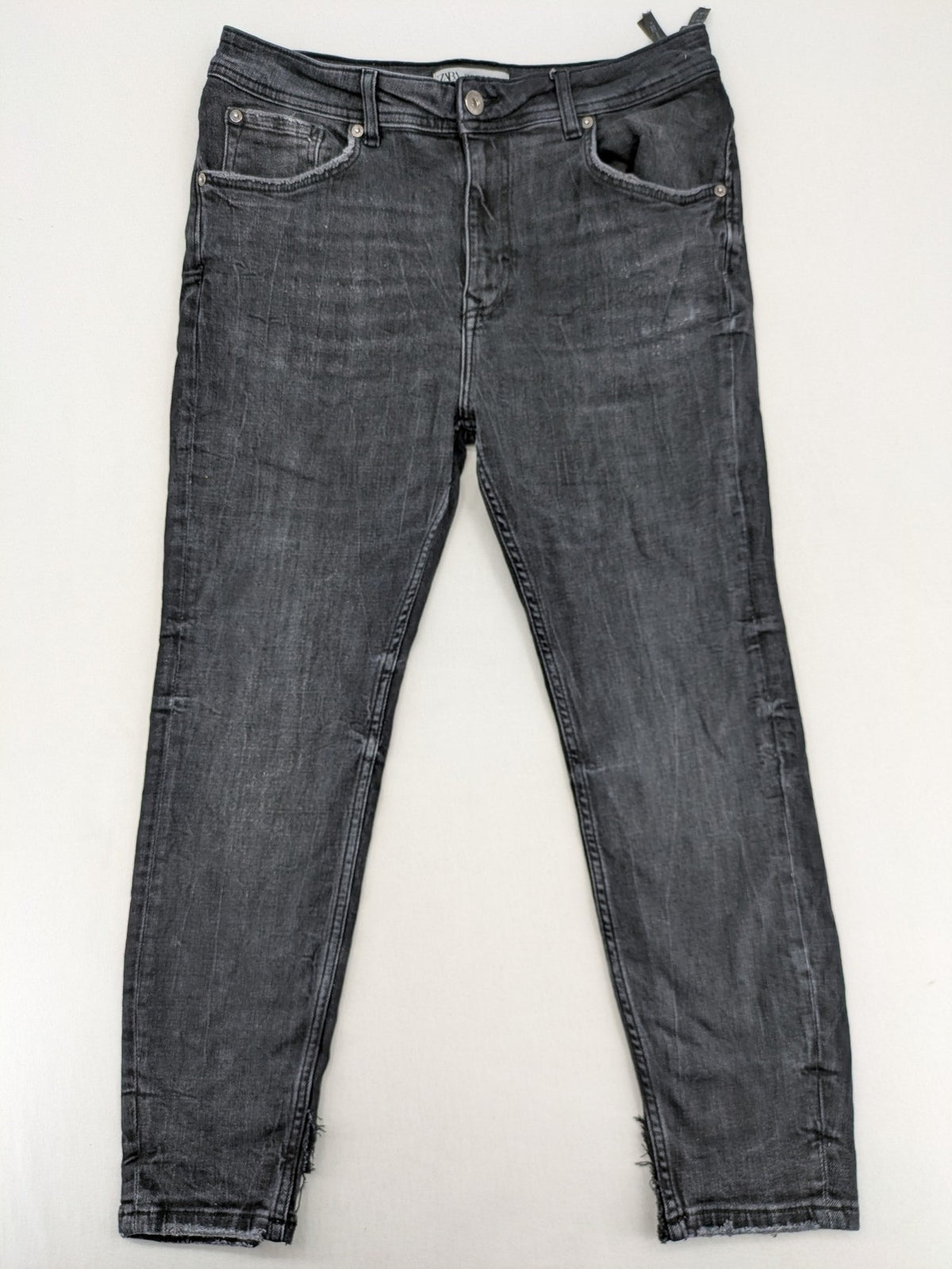 Zara slim fit jeans grey washed with distressed details and frayed hem.
