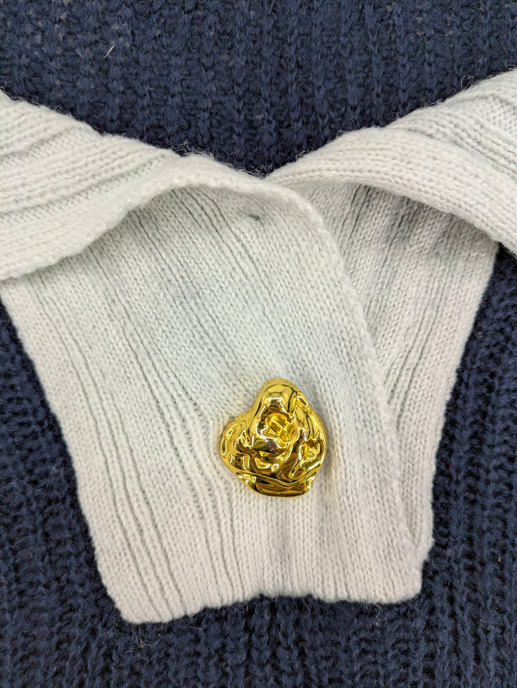 Dazy navy turtle neck jumper with contrasting collar and gold heart button detail.