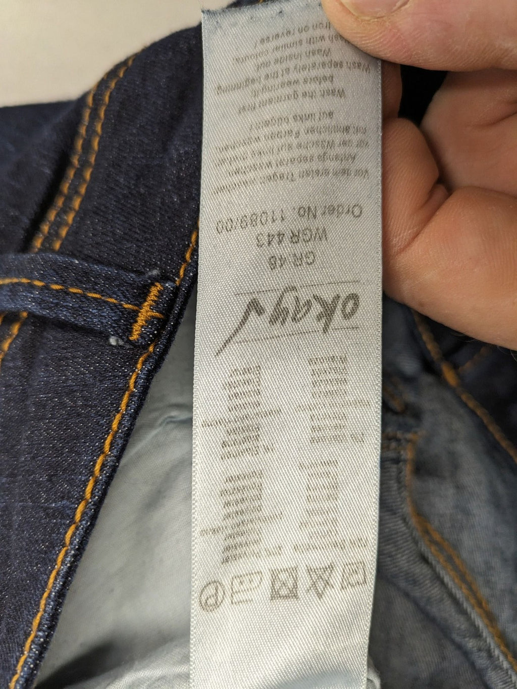 Okay blue straight jeans dark wash 5-pocket style with stretch material for comfort.