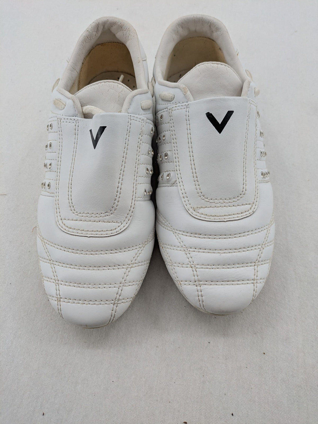 Venice low-top sneakers beige and white with rhinestone embellishments and unique sole pattern.