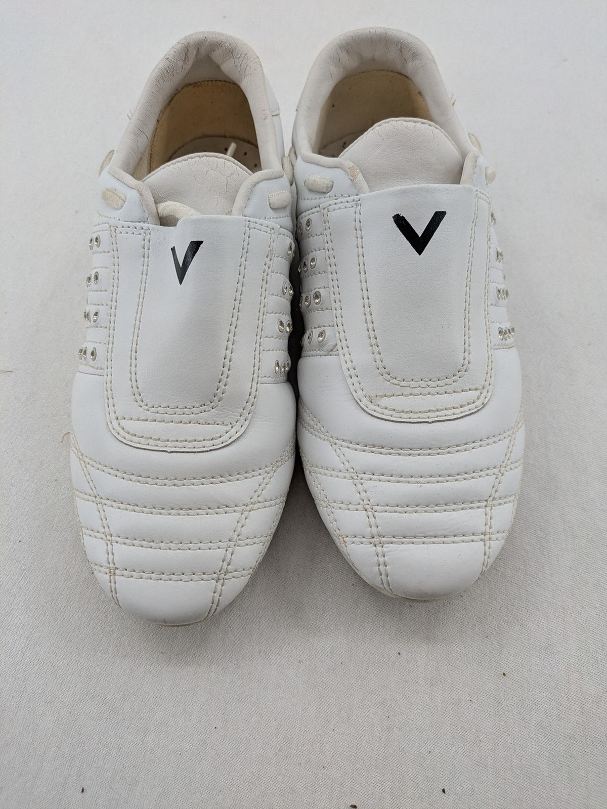 Venice low-top sneakers beige and white with rhinestone embellishments and unique sole pattern.