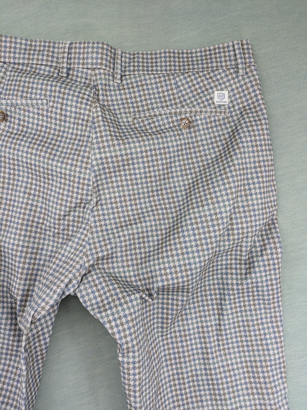 State of Art pink pants houndstooth pattern modern fit with zipper and button closure.