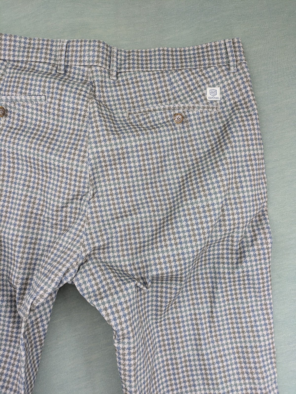 State of Art pink pants houndstooth pattern modern fit with zipper and button closure.