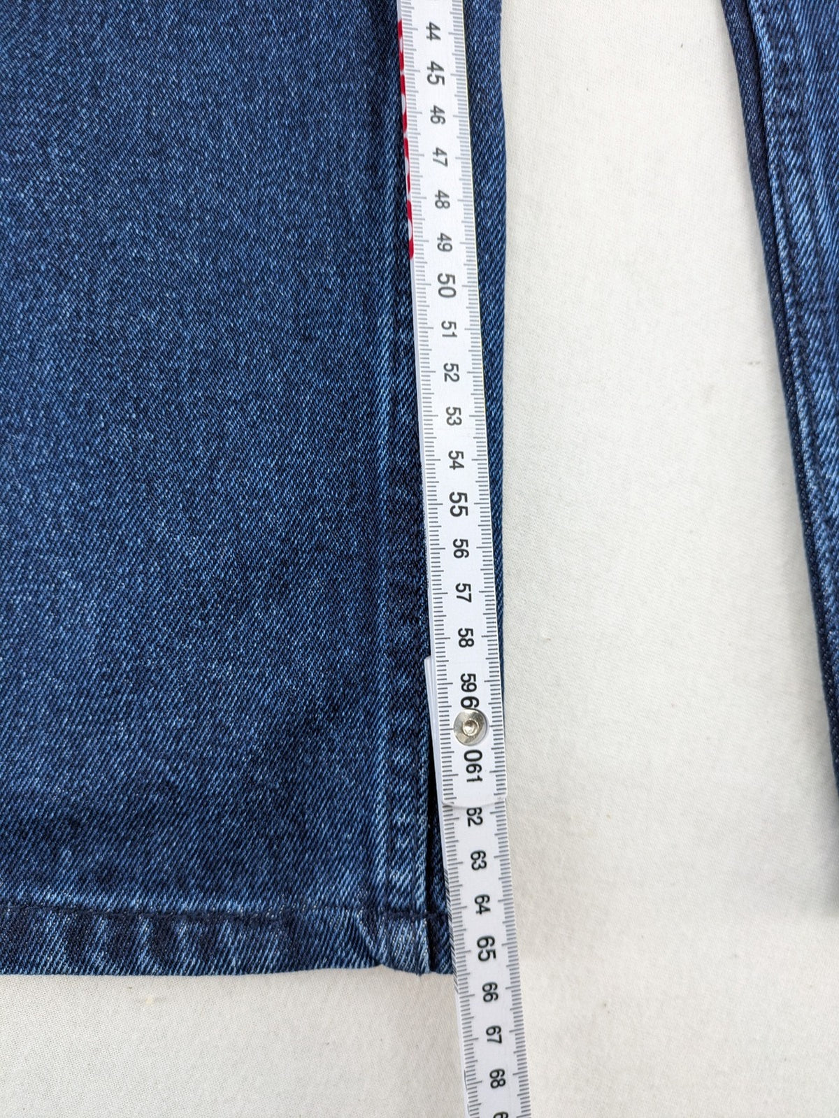 Tchibo blue straight jeans with five-pocket design and wide leg cut in durable cotton.