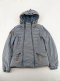 Naketano blue jacket with teddy fleece lining, hood, and leather appliqués.
