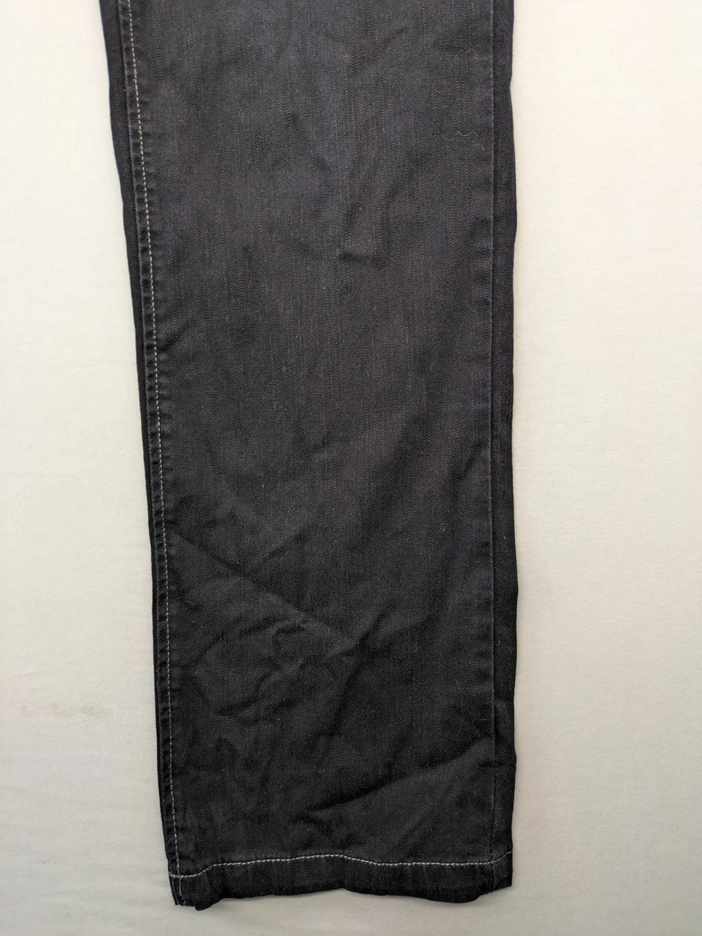 Okay grey straight jeans with contrast stitching and three-button closure, cotton stretch material.