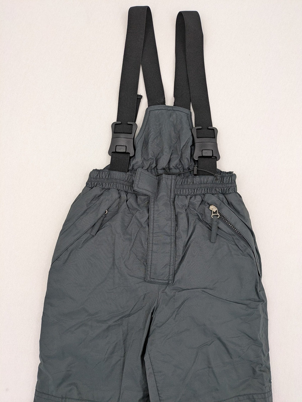 PROLINE grey winter ski pants with adjustable straps and insulated durable material.
