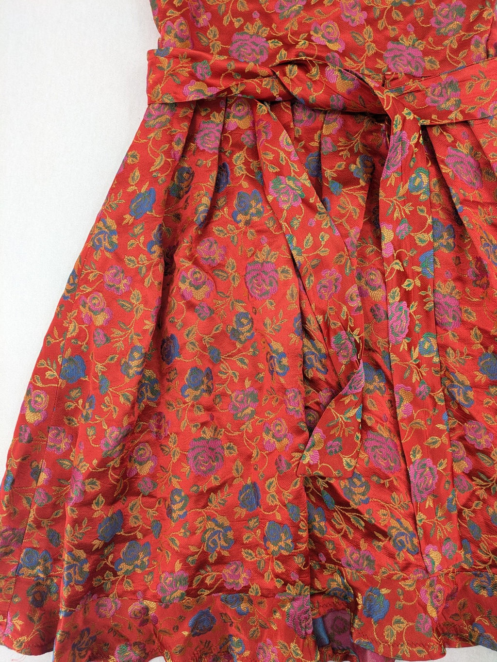 Jacquard multi A-line dress red floral jacquard pattern with matching waist tie.
