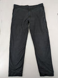 4F black cargo pants with reinforced knees, made from cotton-stretch material.