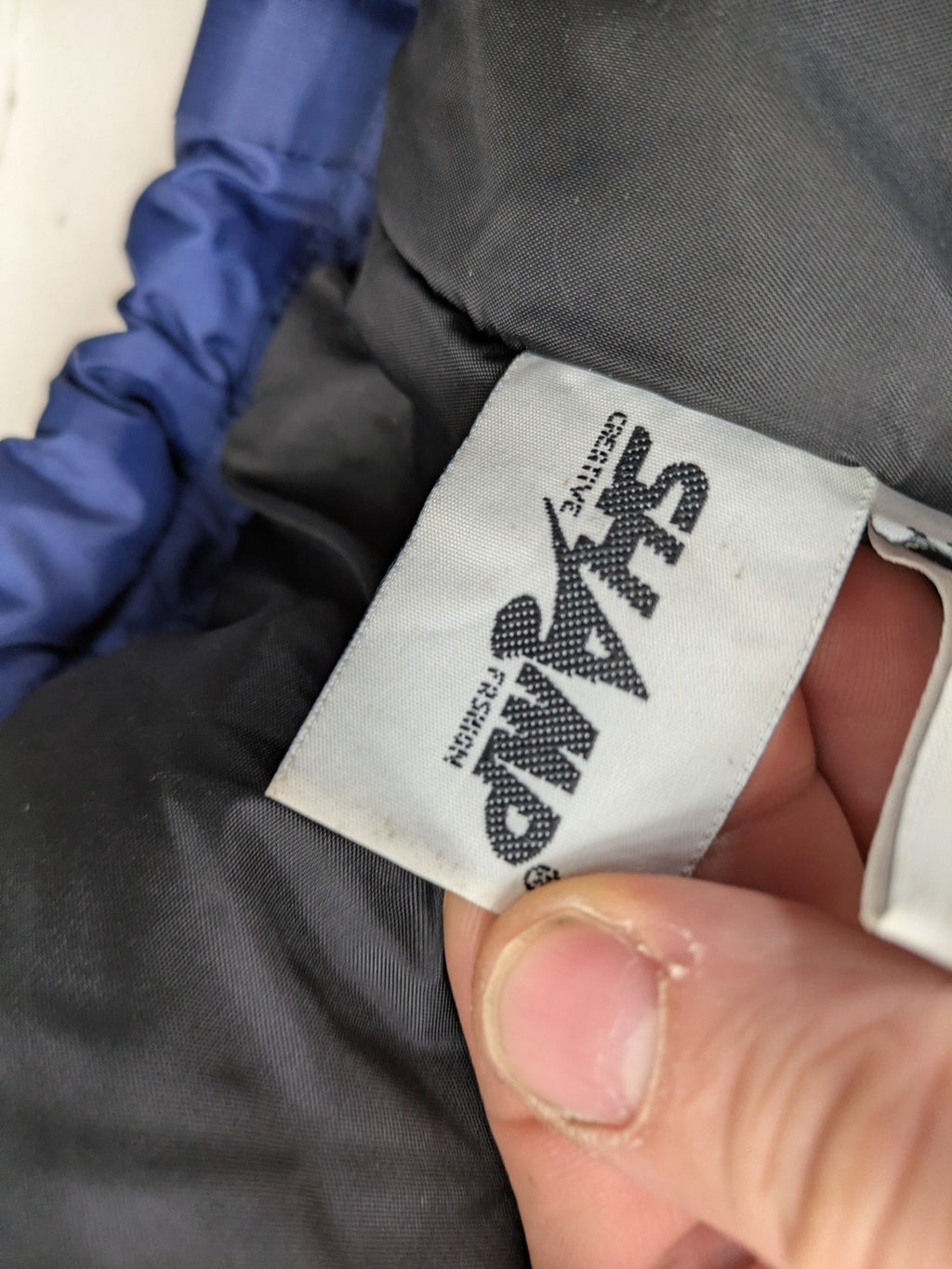 Shamp navy and yellow vintage ski jacket and pants set with retro design.