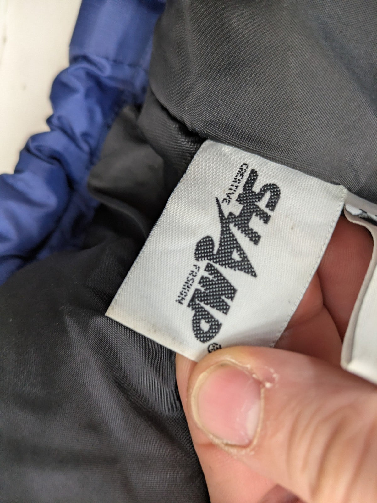 Shamp navy and yellow vintage ski jacket and pants set with retro design.