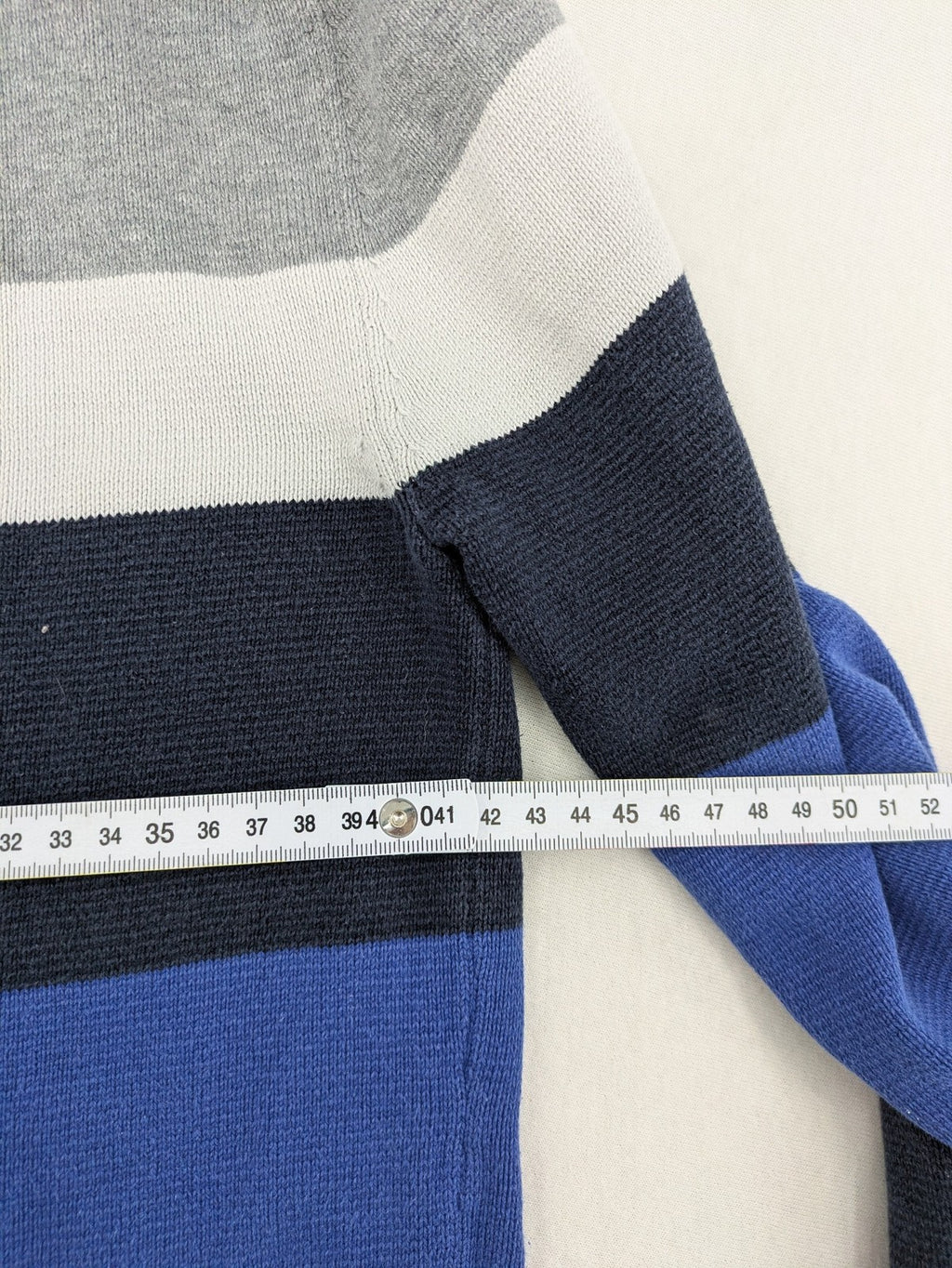 Angelo Litrico navy knit jumper striped pattern in blue, grey, and white, cotton material.