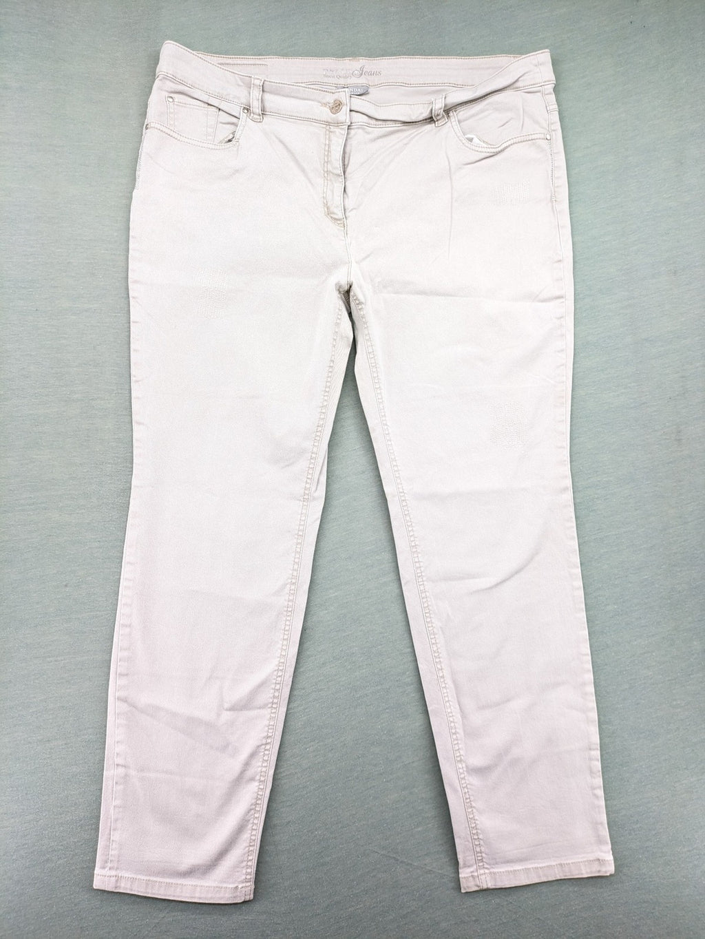 Canda beige straight jeans with strass details and classic five-pocket design.