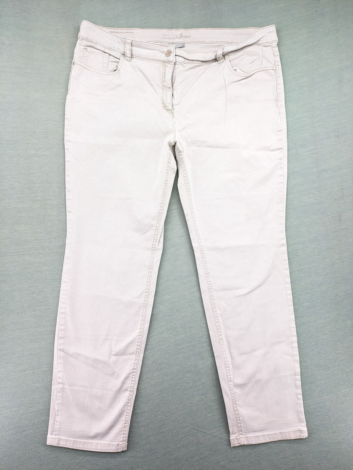 Canda beige straight jeans with strass details and classic five-pocket design.