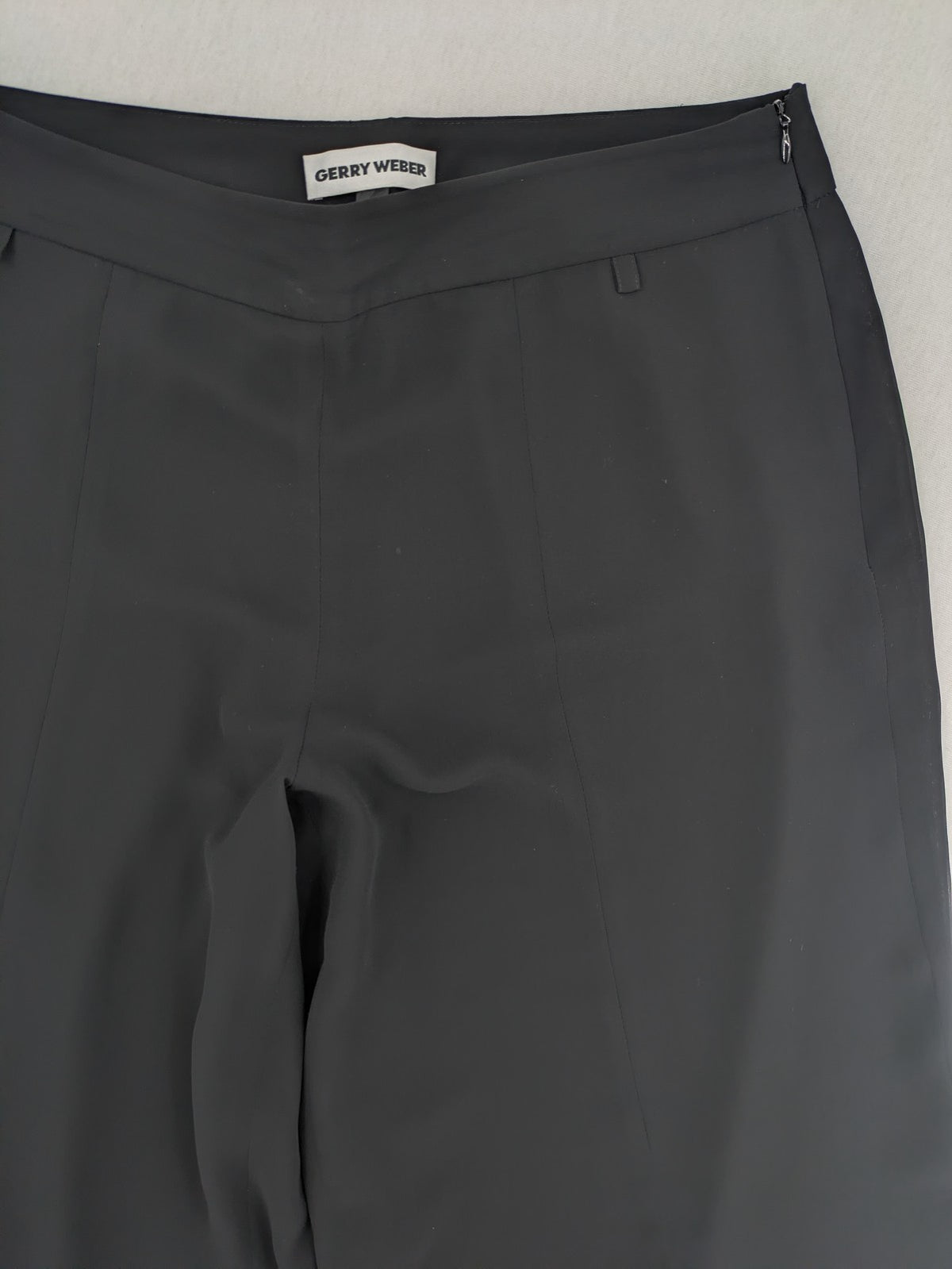 Gerry Weber grey palazzo pants with chiffon overlay and front slits.