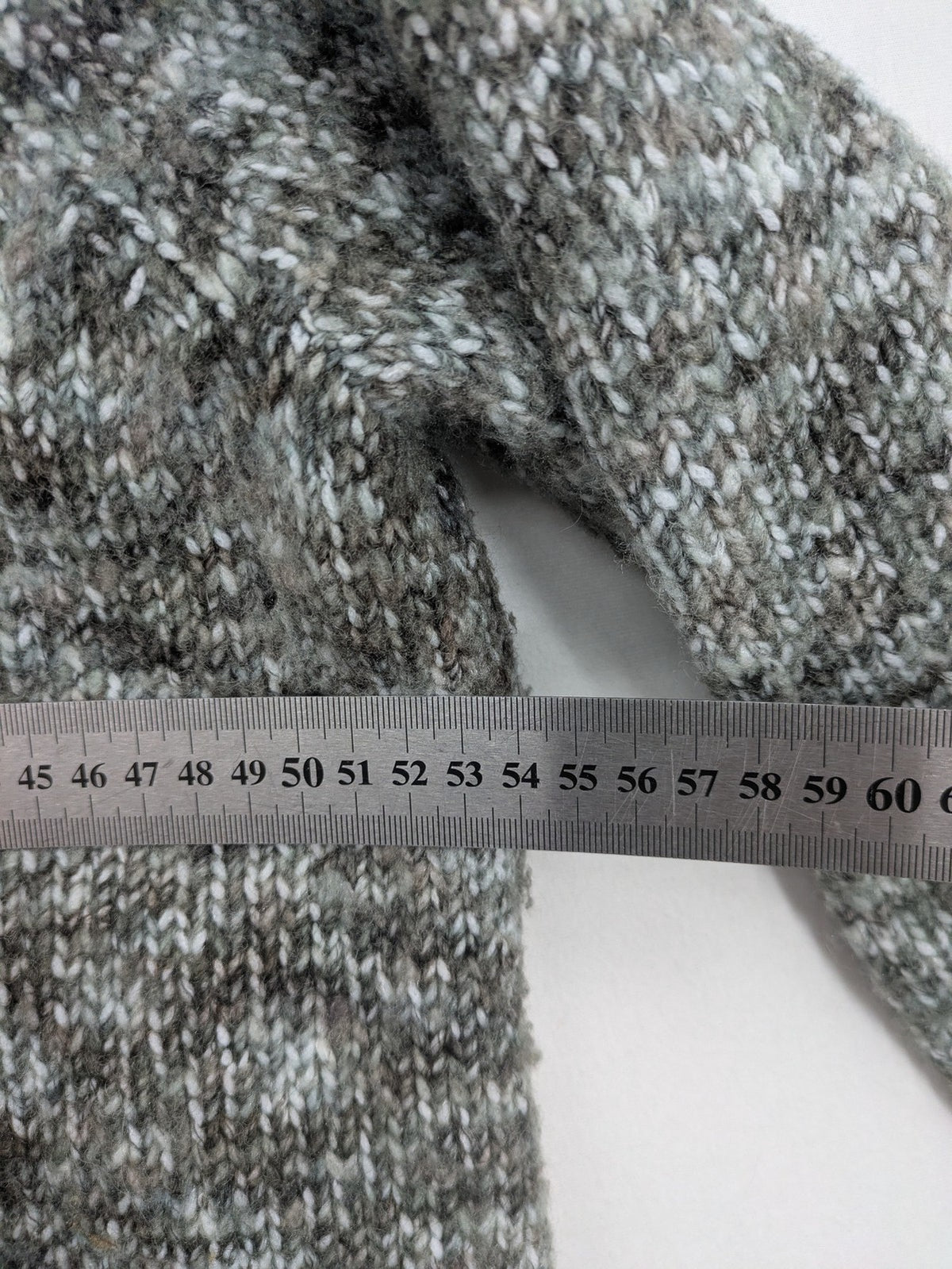 Kenar turtle neck jumper black grey white melange wool blend open knit design
