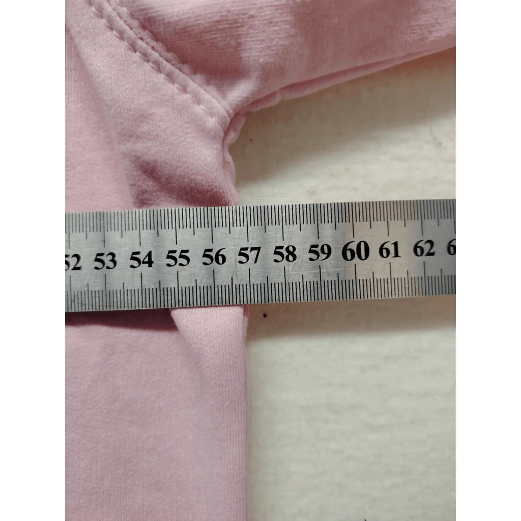 Just Hoods pink zip-through hoodie with "Trinkerbell" graphic, kangaroo pocket, drawstring hood.