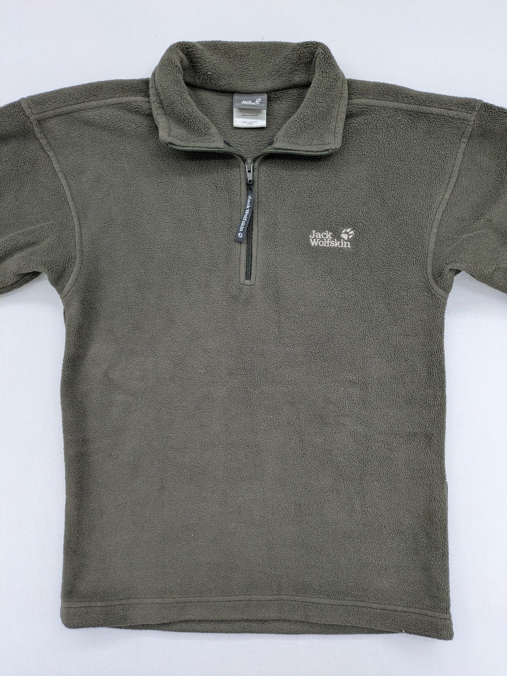 Jack Wolfskin khaki turtle neck jumper with quarter zip and embroidered paw logo.