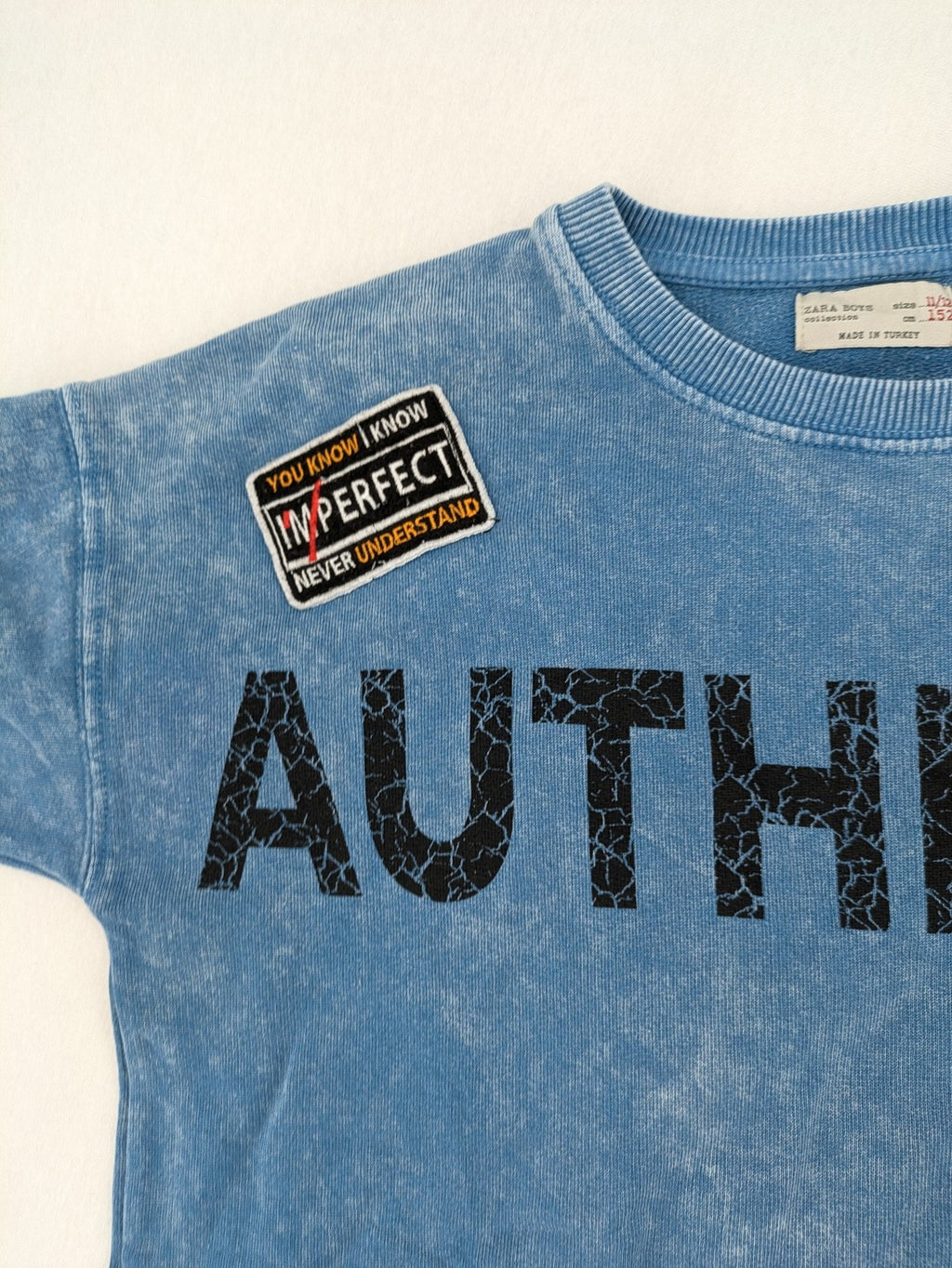 Zara turtle neck jumper blue distressed with graphic prints and patches, size 152.