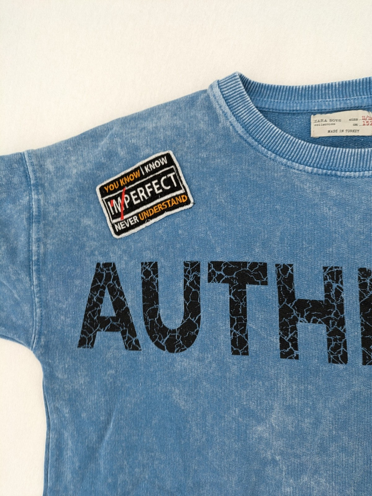 Zara turtle neck jumper blue distressed with graphic prints and patches, size 152.